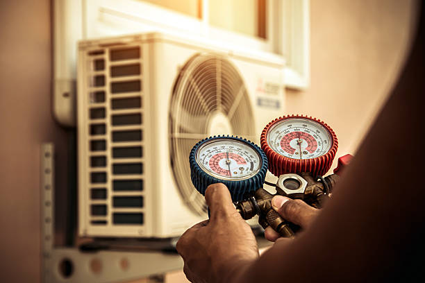 Professional Hvac technician working in Brewster, OH